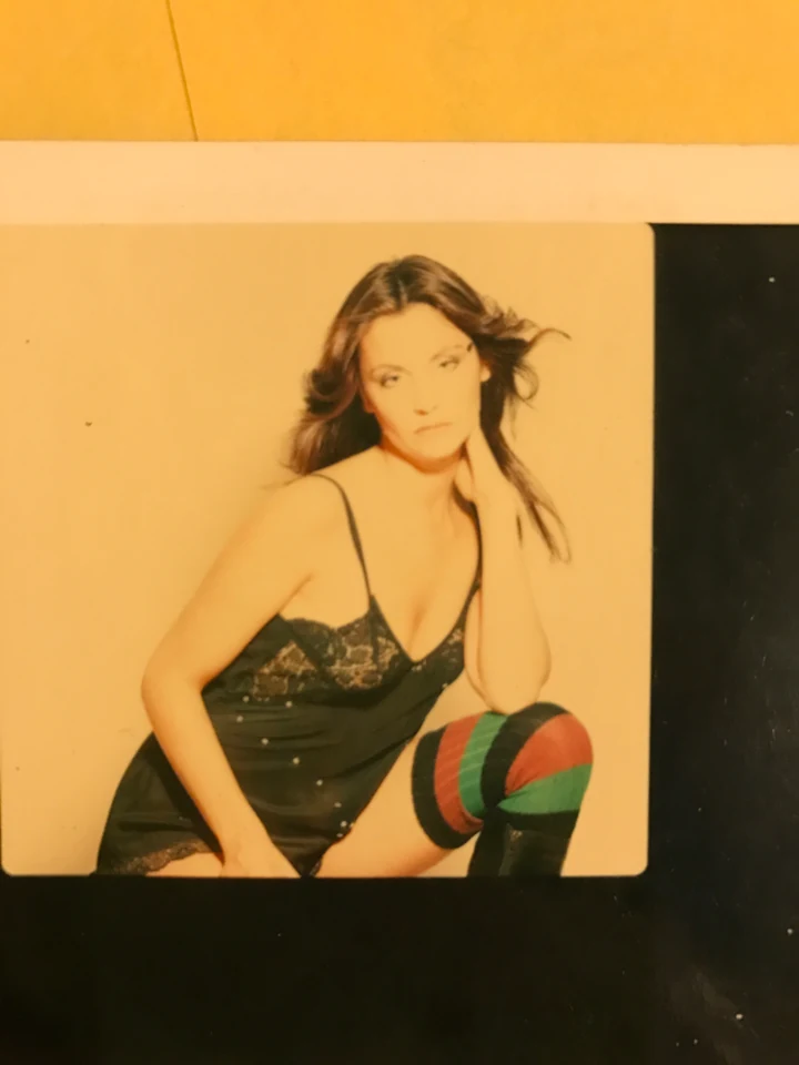 Denise McCann posing in a studio wardrobe test