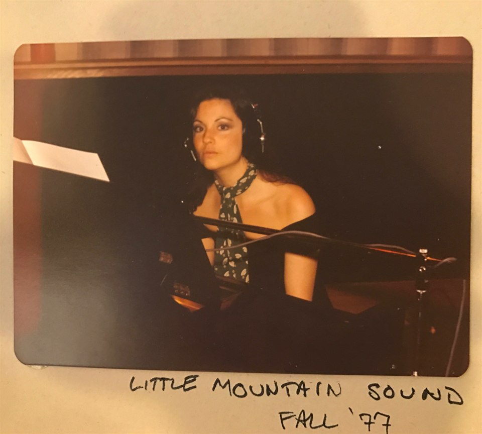 Denise McCann at a studio microphone at Little Mountain Sound in fall 1977